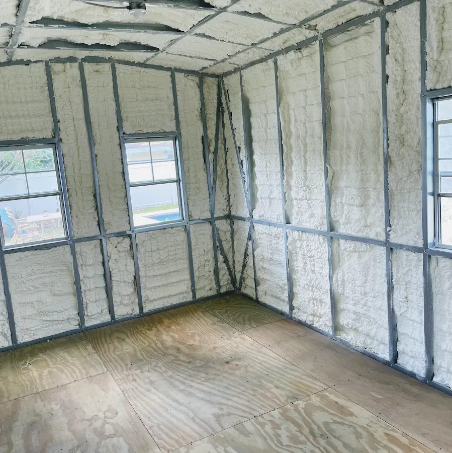 Closed-cell spray foam insulation applied to wall cavities in a residential project in Wildwood
